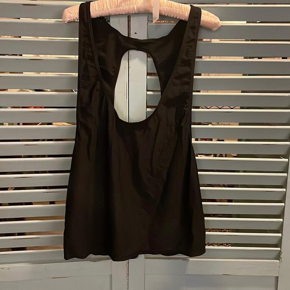 Black exercise cover. Meant to cover tank under.